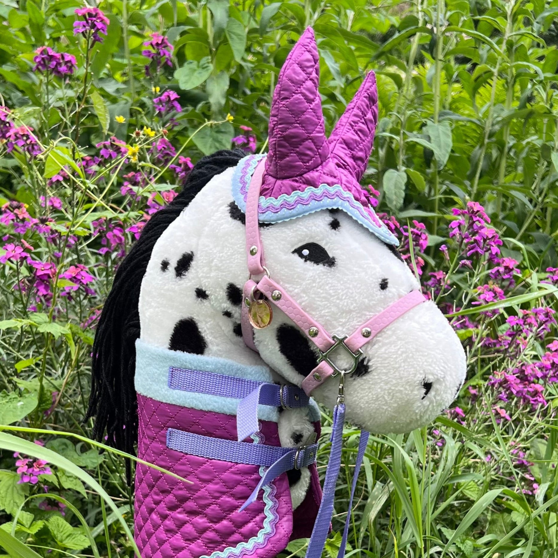 Oornetje paars met bandje in blauw en lila