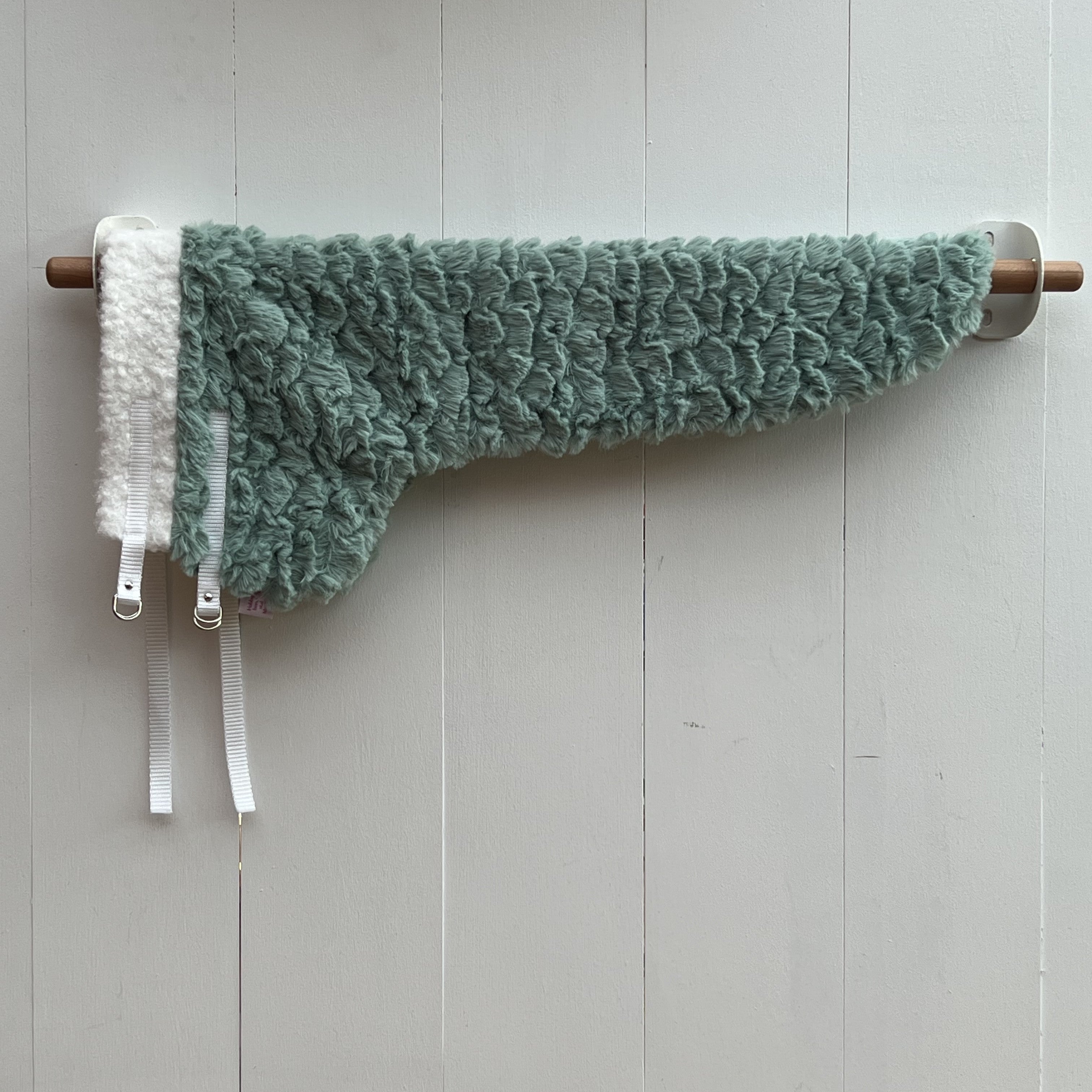 dekentje lang groen stof heeft een schulp