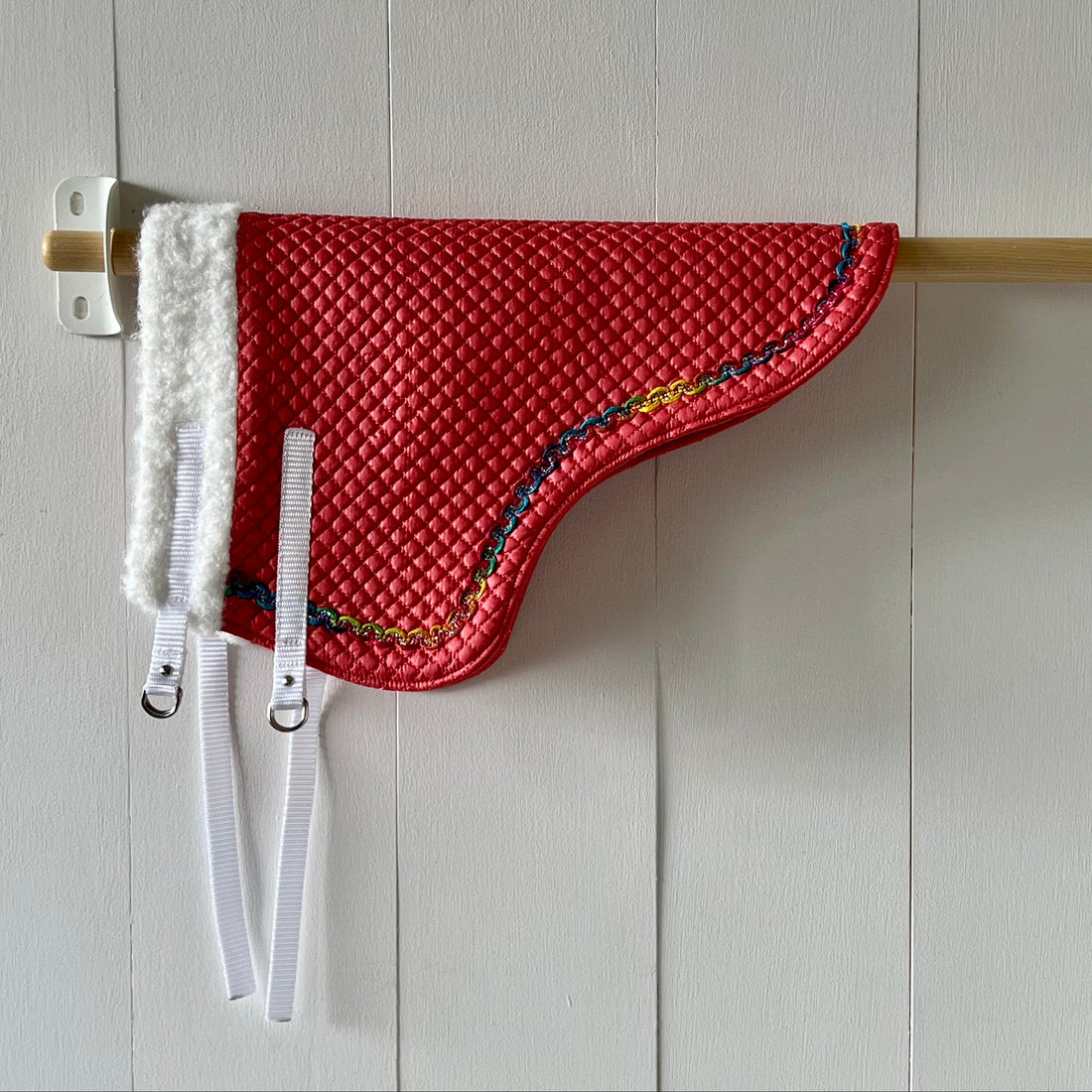 Dekentje kort oud roze met gekleurd band