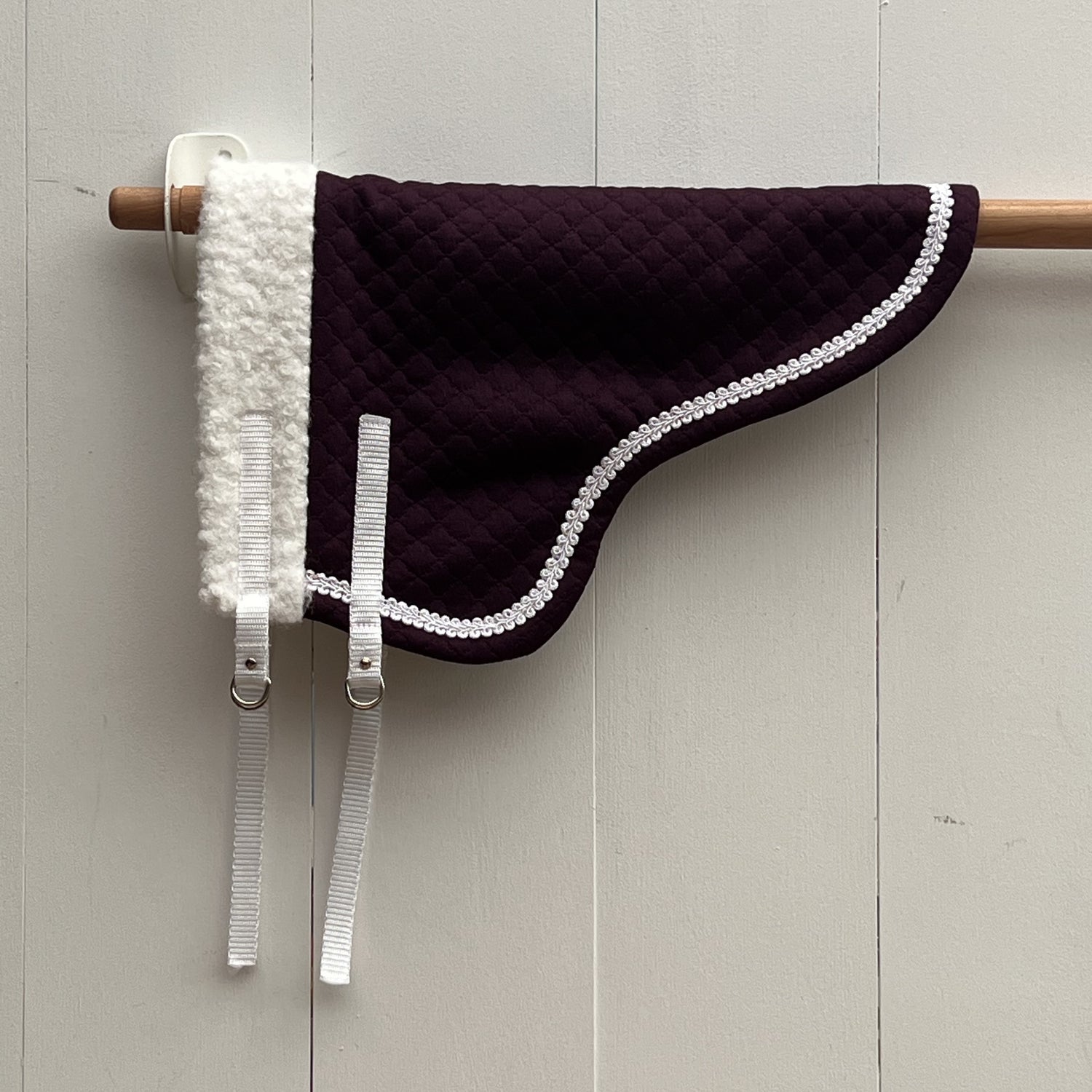 Dekentje kort paars met wit bandje