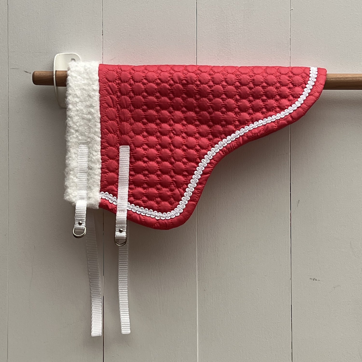 Dekentje kort roze met wit bandje