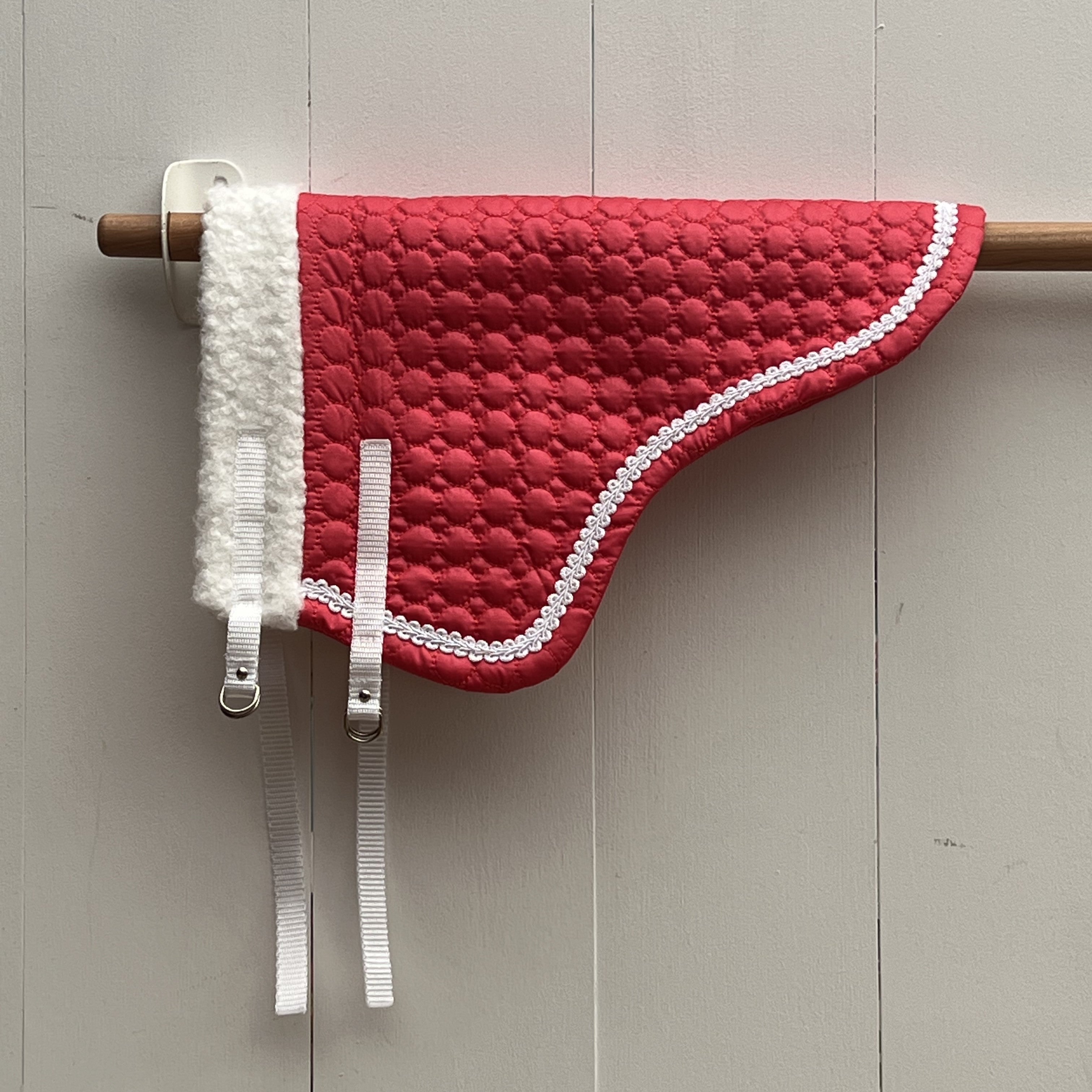 Dekentje kort roze met wit bandje