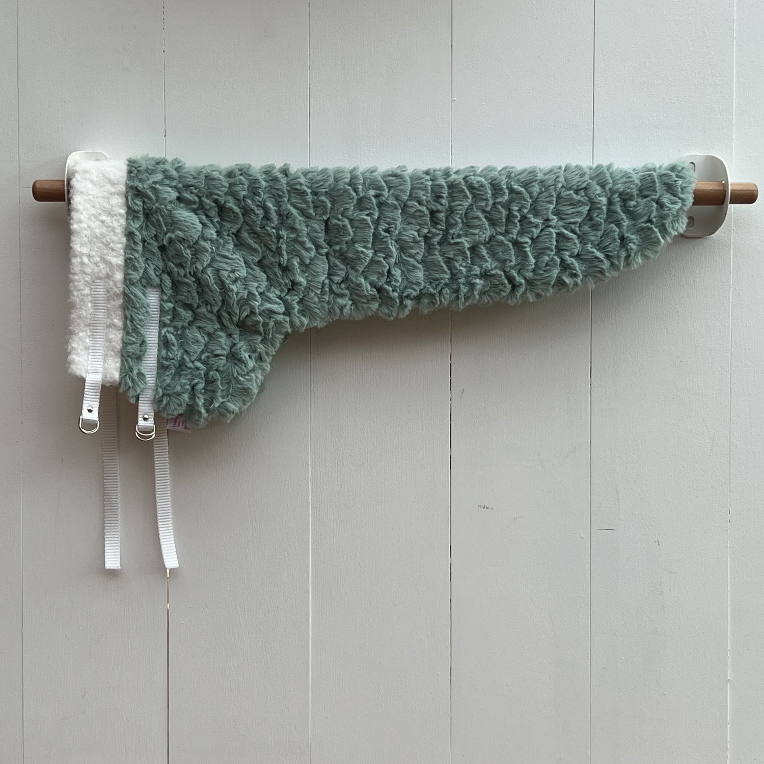 dekentje lang groen stof heeft een schulp