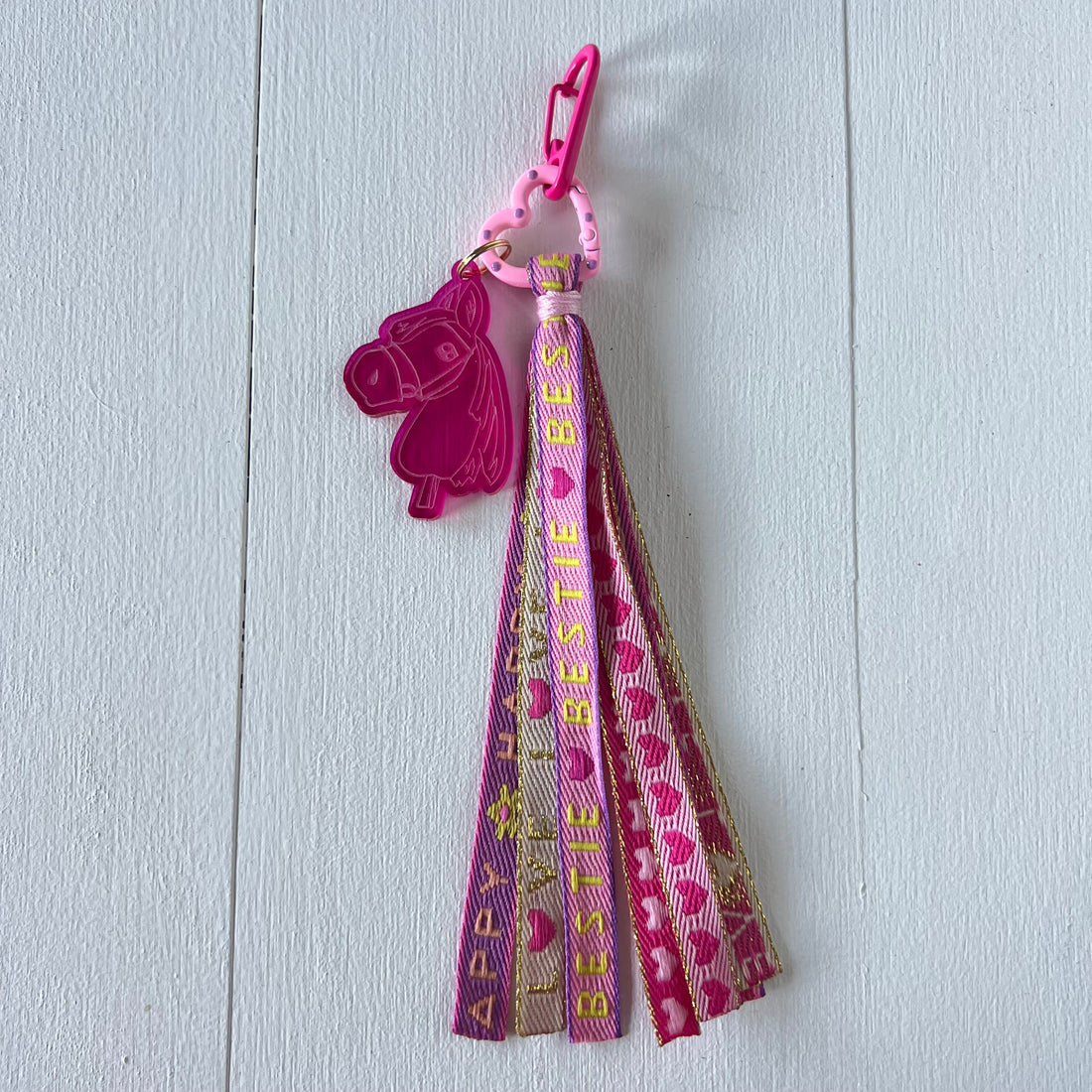 Sleutelhanger hobbyhorse en lint, roze / lila / fuchsia