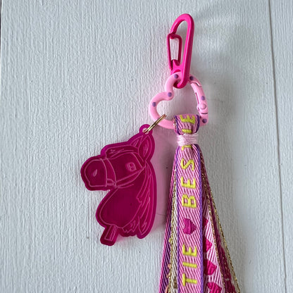 Sleutelhanger hobbyhorse en lint, roze / lila / fuchsia